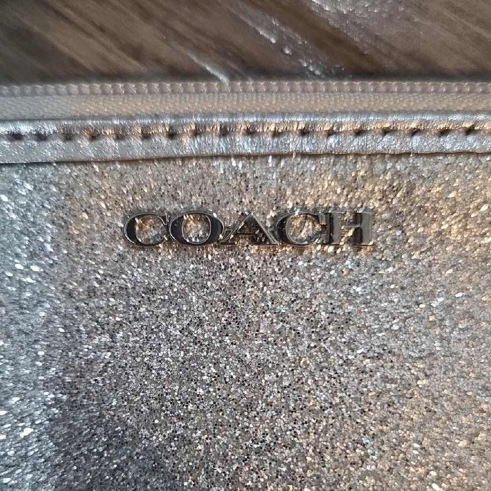 Coach Sparkling Silver Wristlet - Picture 2 of 4